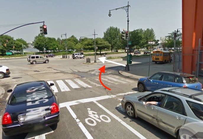 A cement truck driver fatally struck a cyclist at W. 55th Street and 12th Avenue in Manhattan. The red arrow represents the approximate path of the driver and the white arrow indicates the approximate path of the victim, according to NYPD. Image: Google Maps