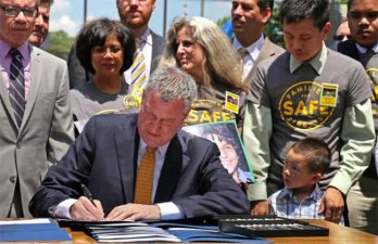 de blasio signing a bill