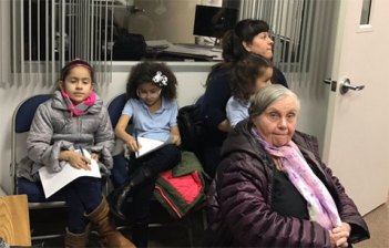 Ann Pfoser Darby, facing the camera, was first appointed to Queens CB 4 in 1987 and held her seat for 30 years, until she was canned for cheering on deportations. Photo: Juan Restrepo