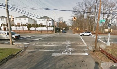 A motorist, in the white SUV at right, waits to make the same turn taken by the driver who killed Jenna Daniels. Image: Google Maps