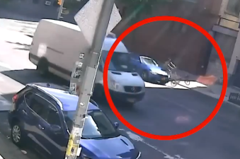 A nearby security camera caught the moment when a hit-and-run motorist intentionally struck Sam Goater on Second Avenue.