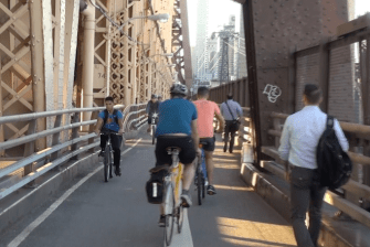 TransAlt says the city should create more space for cyclists, like these crowded riders sharing space with pedestrians on the Queensboro Bridge, during the crisis. Photo: Clarence Eckerson