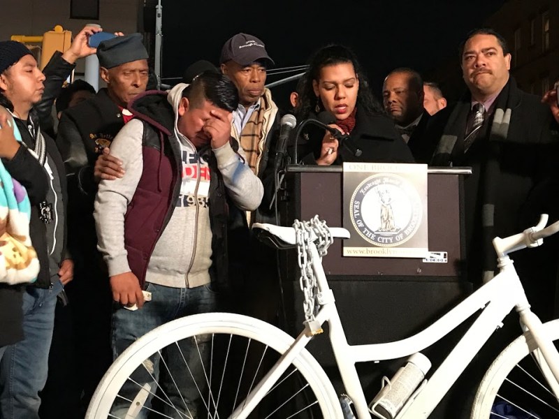 Edwin Ajacalon's uncle, Eduardo Vicente, broke down before he could speak at last night's vigil. Photo: Dave Colon