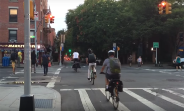 Cyclists proceeding alongside pedestrians at an LPI on Atlantic Avenue. Photo: Doug Gordon