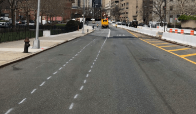 A bi-directional bikeway and added sidewalk space are coming to Park Row in Chinatown, restoring public access after years of post-9/11 restrictions. Photos: Noel Hidalgo