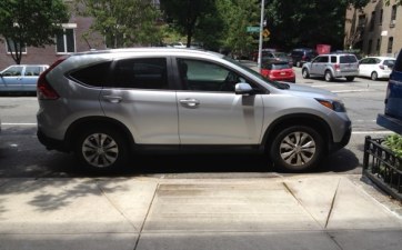 In 2009 DOT made it legal to park in unmarked crosswalks, impeding sidewalk access for disabled New Yorkers at intersections citywide.