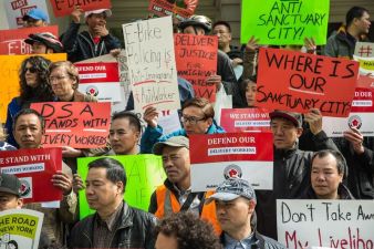 Delivery workers rallying outside City Hall this morning. Photo copyright Scott Heins, used with permission.