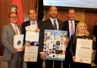 Sanitation Salvage owner Steven Squitieri, second from left, with Bronx Borough President Ruben Diaz Jr. and then-Assembly member Mark Gjonaj in 2016. Photo: Ruben Diaz Jr./Flickr