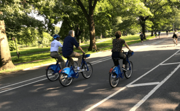 Mayor de Blasio (center with Borough President Eric Adams and DOT Commissioner Polly Trottenberg) was last seen riding a bike in August, 2018. Photo: Natalie Grybauskas