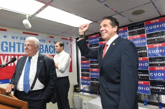 Governor Cuomo in Bensonhurst with Andrew Gounardes and Brooklyn Democratic boss Frank Seddio (podium).  Photo: Twitter/Andrew Cuomo