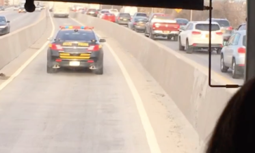 Express buses speed through Brooklyn in the HOV-3 lane on the Brooklyn-Queens Expressway. Photo: Vince DiMiceli