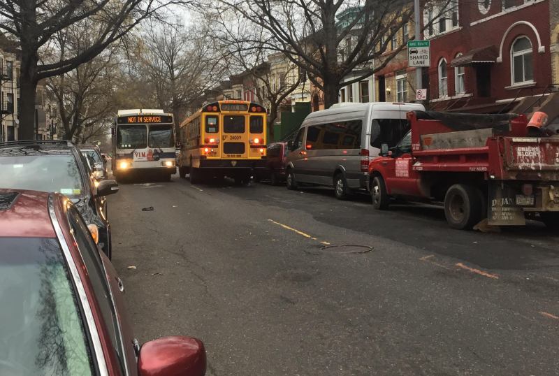 The standoff: Buses cannot safely pass each other on St. Johns Place between New York and Rogers avenues. Photo: Isaac Blasenheim