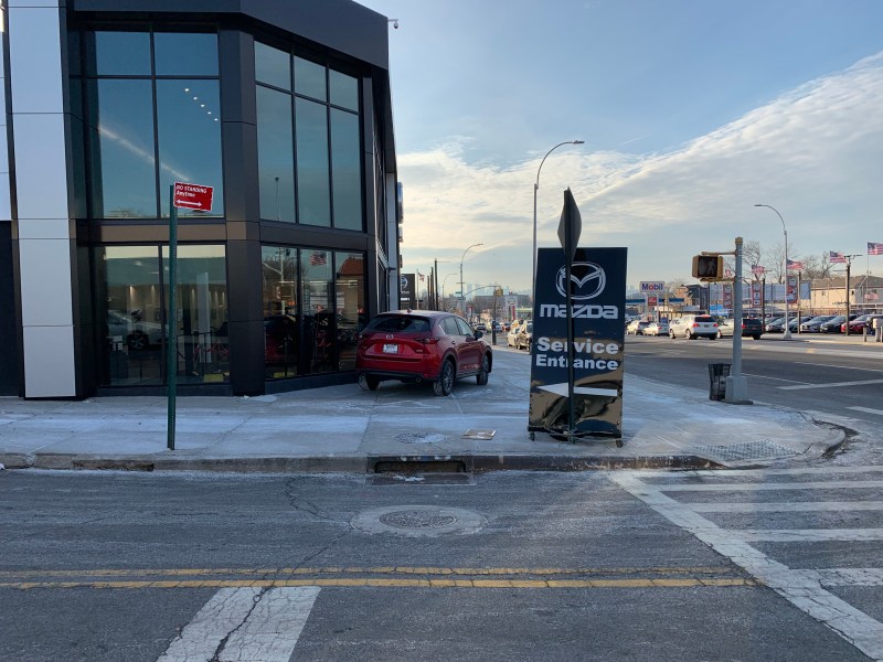 The service entrance leads to a supposedly car-free 78th Street with an in-the-works pedestrian plaza and park. Photo by Clarence Eckerson.