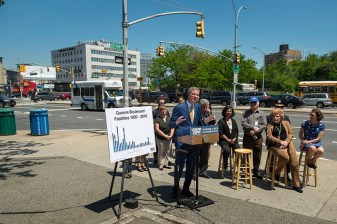 In May 2017, Mayor de Blasio and Council Member Karen Koslowitz touted the city's efforts — including the installation of bike lanes — with a visit to the boulevard. Koslowitz now opposes the project. Photo: Ed Reed/Mayoral Photography Office