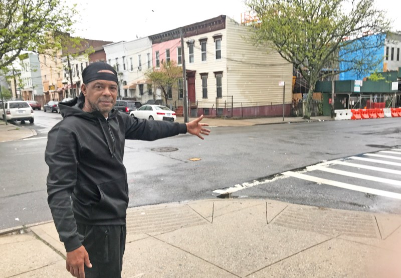Gregory McClean at the intersection in Brooklyn where his brother, Charles, was killed by a postal service driver. Photo: Gersh Kuntzman