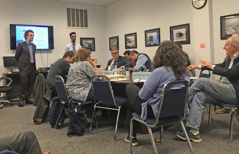 On Thursday night, DOT officials unveiled their plan to allow car-storers to continue to use the public right of way to block safety improvements. Board member Steve Harrison, who doesn't want to remove parking, is on the far right. Photo: Dave Colon