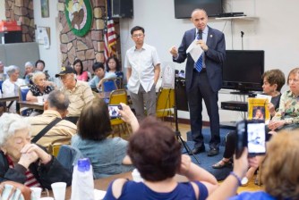 Mark Treyger highlighted the ineffectiveness of traffic lights while speaking to Bensonhurst seniors in June. Photo: David Meyer