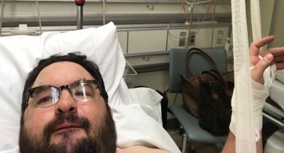 Cyclist Jeremy Posner, being treated at New York Presbyterian Hospital after being forced off his bike by a motorist.