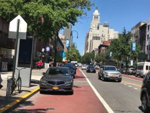 The city is cutting funding for placard enforcement and improving bus service. Photo: Dave Colon