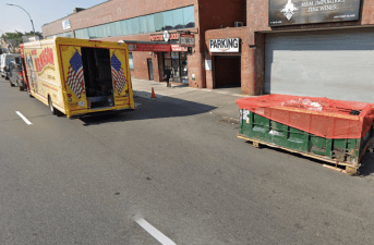 Even on a Google street view, the entrance to the parking garage is a chaotic place. But that's Coney Island Avenue for you. Photo: Google
