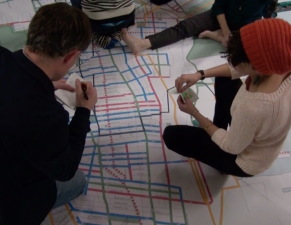 Jersey City residents looked over a map of the city to figure out the best places for bike lanes — not to reject them, though, but to make them better. Photo: Clarence Eckerson Jr.