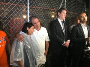 10-year-old Enzo Farachio's parents Mary Majao and Angel Farachio during a vigil for their son last year. File photo: Julianne Cuba