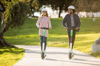 Riders using Lime scooter. Photo: Kris Krug