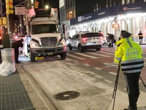 Police investigate a fatal crash at the corner of Broadway and Howard Street. Photo: Dave Colon