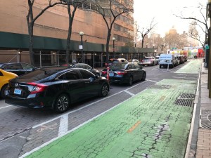 The two-way bike lane on 37th Street. The DOT is advertising for bike-mounted bike-lane apprentice inspectors. Photo: Streetsblog