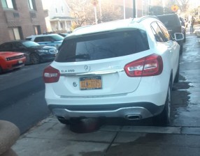 Here he (or she) is again: The NYPD driver of this car has racked up 18 speeding and red light tickets.