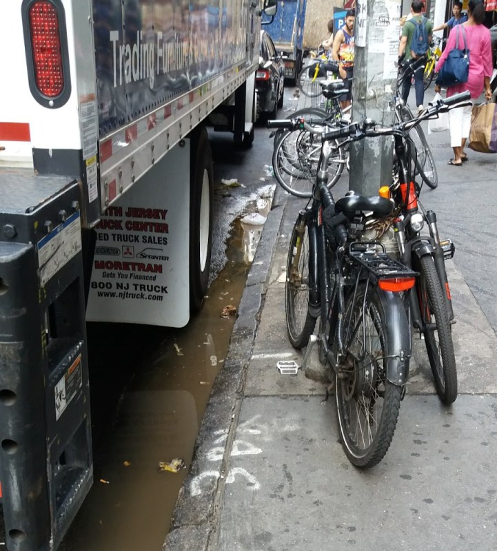 W. 56th Street in Manhattan is a real mess, and could benefit from bike corrals. Photo: Janet Liff