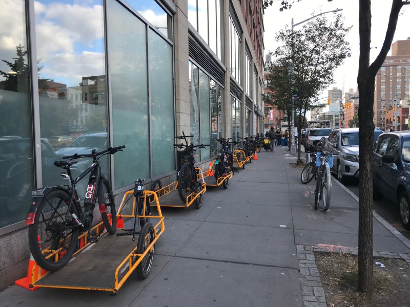 Whole Foods parks bike on the sidewalk on Houston Street, which could probably also use a cargo bike corral.