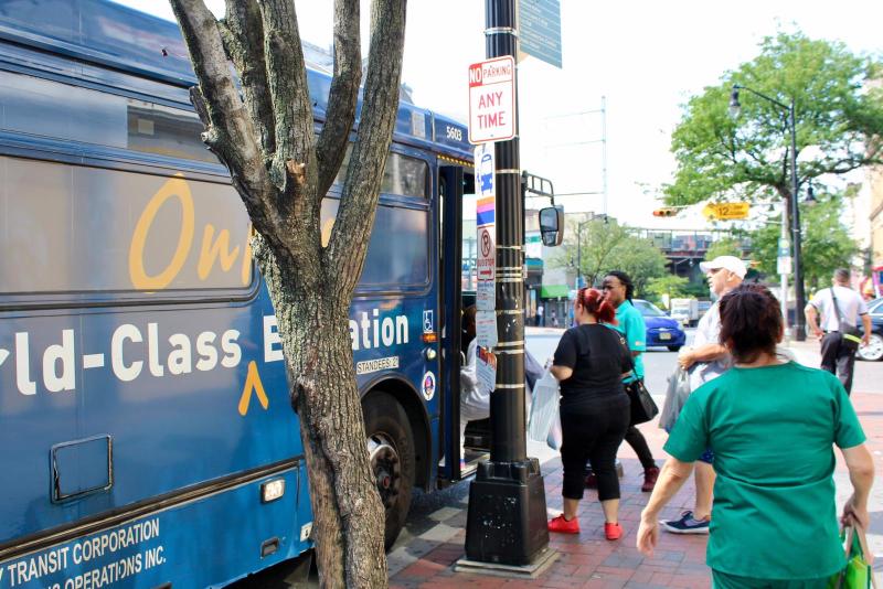 Essential workers board an NJ Transit bus. With fare revenue down drastically, the tri-state region will need more federal money if it wants to keep transit running and eventually reopen the economy. Photo: Isobel Cully