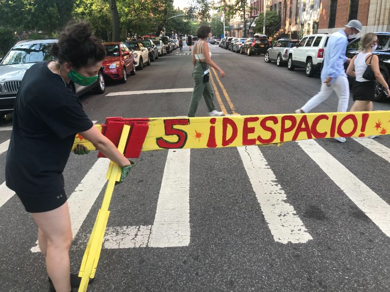 Police have done such an inconsistent job of maintaining open streets that residents, like these on Avenue B, have started doing the work themselves.