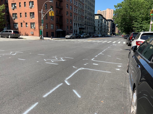Crews have started blocking off space for the Central Park West bike lane. Photo: Ken Coughlin