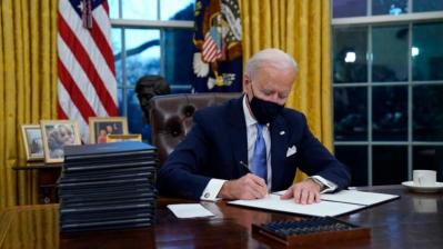 Work cut out. Biden on Day 1. Photo: White House