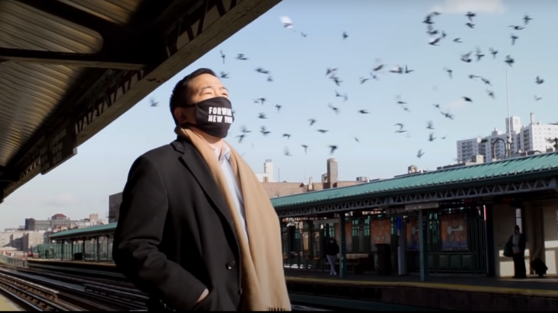 Yang on an elevated subway platform this past winter. Photo: Yang Campaign