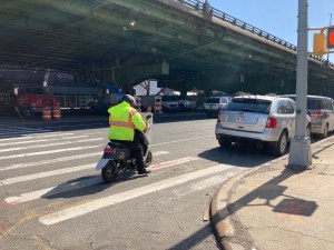 A moped rider. File photo: Julianne Cuba