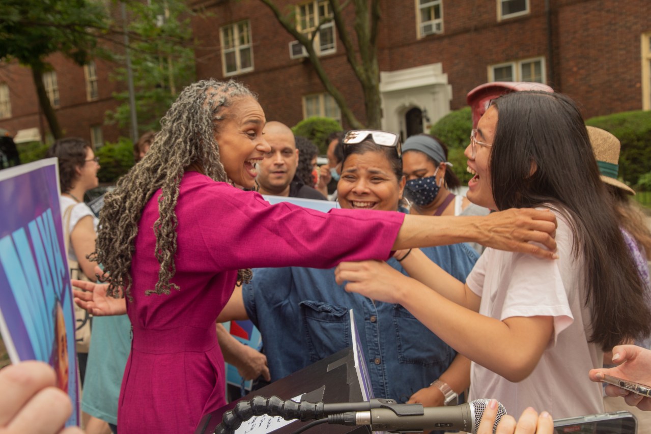 Henry Mei gets a hug from mayoral hopeful Maya Wiley. Photo: Gustavo Rodriguez