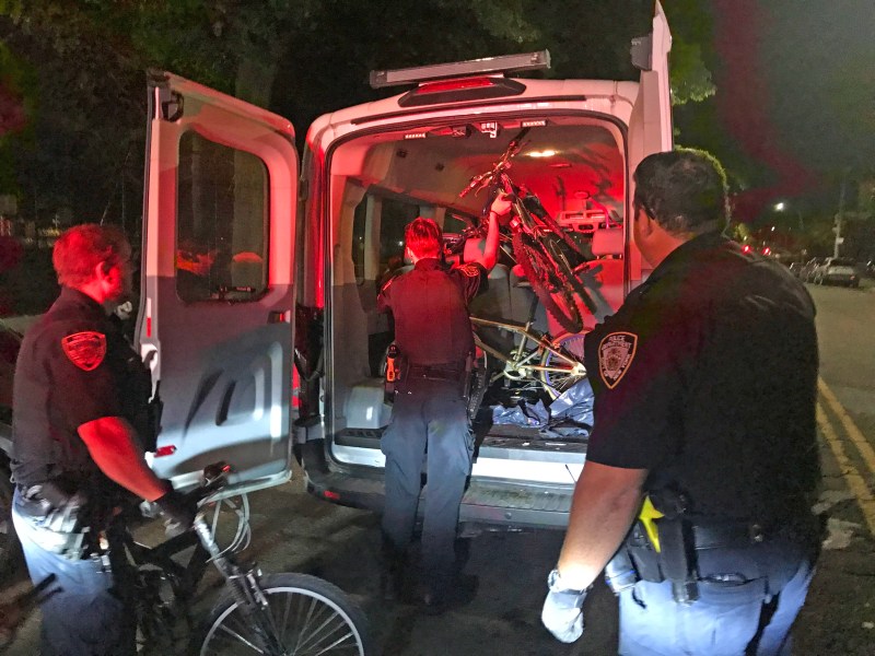 Cops taking away bikes. Photo: NYPD