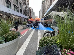 Planters and furniture on the NoMad Piazza Pop-Up. Photo: File