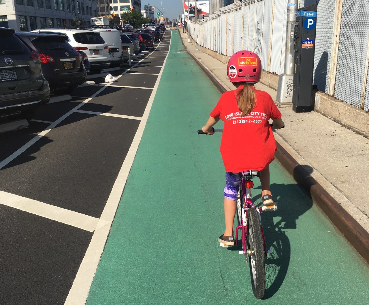 Virginia Baglia commutes to YMCA summer camp via Skillman Avenue, August 2019. Photo: Alan Baglia