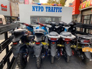 Unsold illegal mopeds seized by the NYPD. Photo: NYPD
