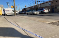 The scene of the crash, looking north up Rockaway Avenue. The Godfrey's van is making the same turn as the Sanitation driver made when he struck the moped rider. Photo: Jesse Coburn.
