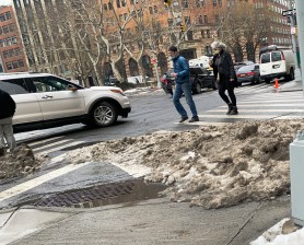 Four days after the end of the weekend snowfall, many curb cuts remain uncleared. Photo: Gersh Kuntzman