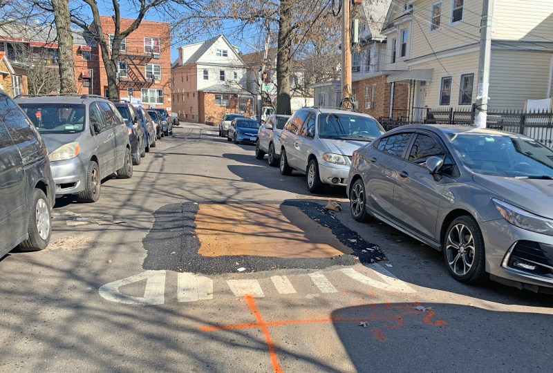 The city covered over a sunken part of 40th Drive in Queens on Friday — but only after a cyclist was killed after failing into the depressed roadway. Photo: Gersh Kuntzman