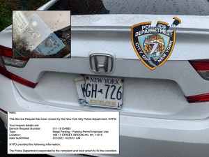 This is the face of the NYPD today. Or make that the deface.