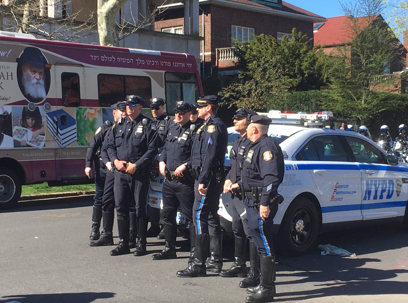 NYPD officers in Brooklyn. Cops who live outside the city often act like an occupying force, State Sen. Kevin Parker writes. Photo: AdmiralHalseyy via Wikimedia Commons
