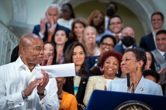 The Adams family: Eric and Adrienne sealed a budget deal last week. Photo: Ed Reed/Mayoral Photography Office