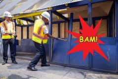 Mayor Adams taking a sledgehammer to an abandoned outdoor dining shed. Photo: Mayor's Office